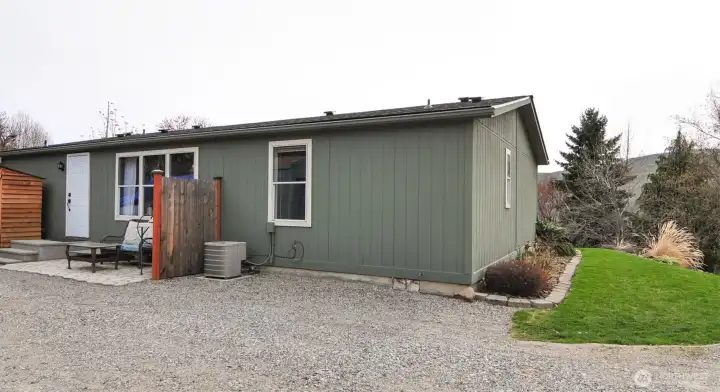 BACK OF HOME WITH SIDE YARD