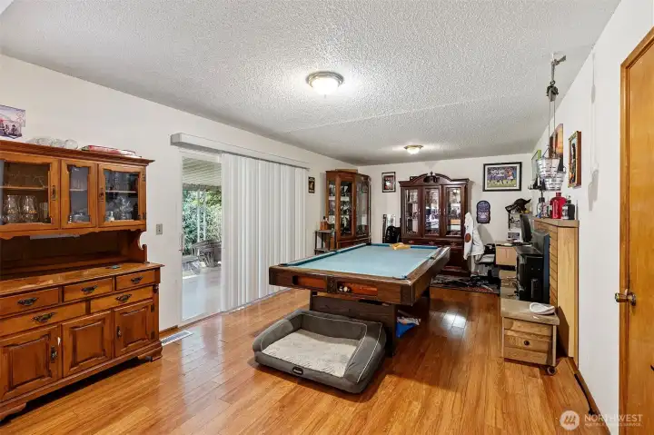 Family room with slider to the back yard.