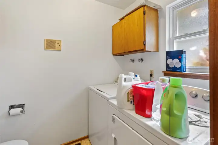 Laundry room w/ bathroom.