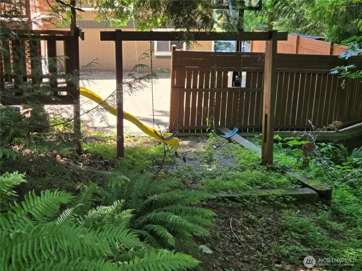 this is on neighbors property and does not go with the sale.