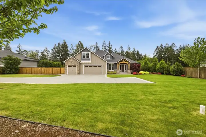 Exterior has been meticulously landscaped and has permanent trim lights