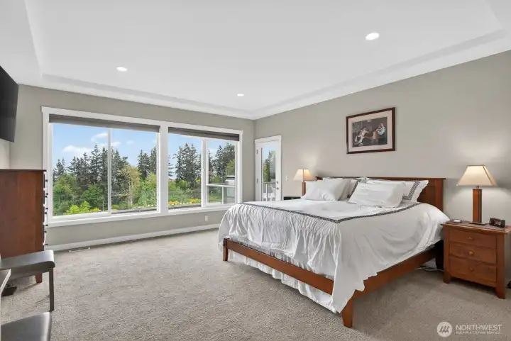 Wake up to beautiful sunrises and views from you Primary Bedroom