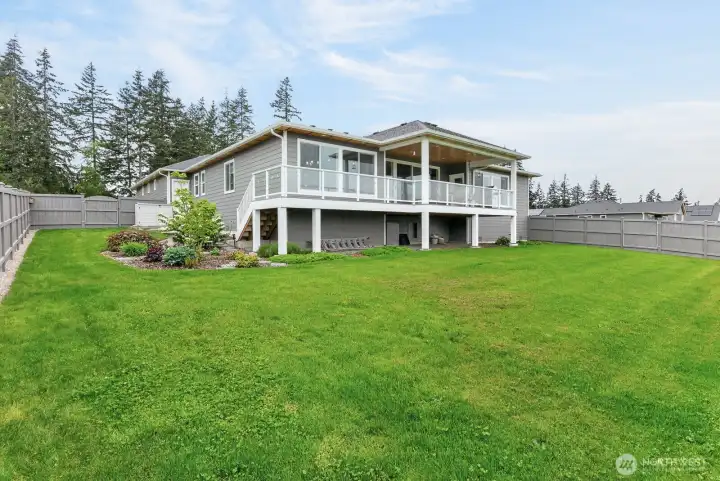 The fenced yard area and low-maintenance landscaping make it easy to enjoy year-round
