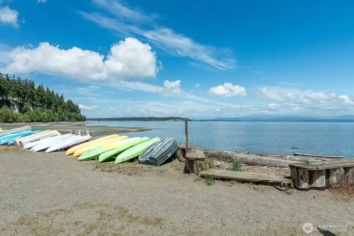 Enjoy optional access to three private Camano Country Club beaches