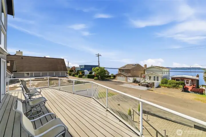 Large deck is great for entertaining or just sitting and enjoying your favorite beverage while taking in all the beauty of Redondo. Maybe even see an osprey or eagle catch its dinner. This is looking South. Large deck is great for entertaining or just sitting and enjoying your favorite beverage while taking in all the beauty of Redondo. Maybe even see an osprey or eagle catch its dinner. This is looking South.