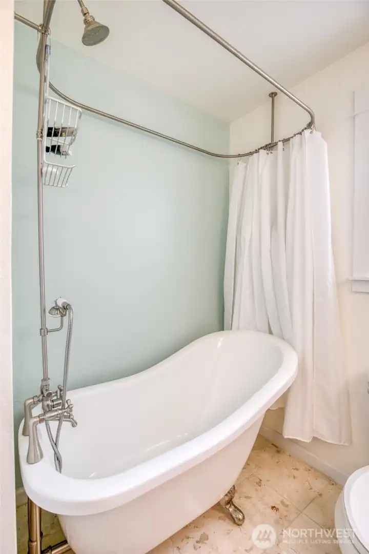 Have a relaxing soak in the clawfoot tub after a day of beachcombing Have a relaxing soak in the clawfoot tub after a day of beachcombing