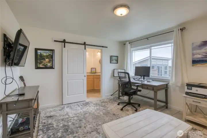 Main floor bedroom with ensuite is also ideal for a home office Main floor bedroom with ensuite is also ideal for a home office
