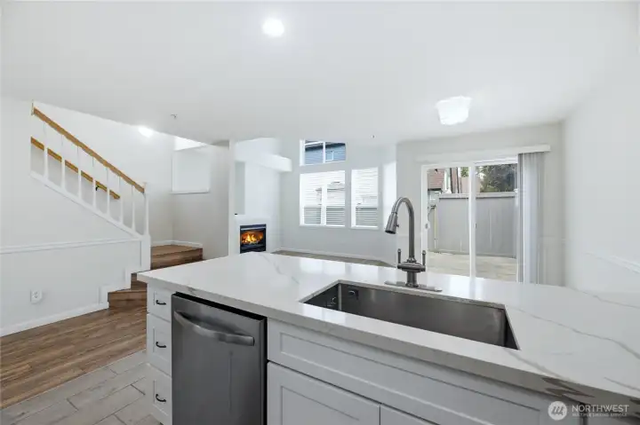 Recently Remodeled Kitchen with Stainless Steel Appliances, Quartz Counters & Tile Backsplash