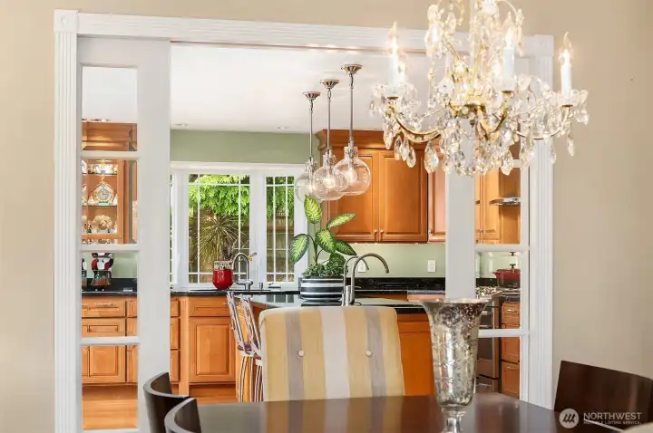 Formal dining room with French sliding glass doors. Formal dining room with French sliding glass doors.