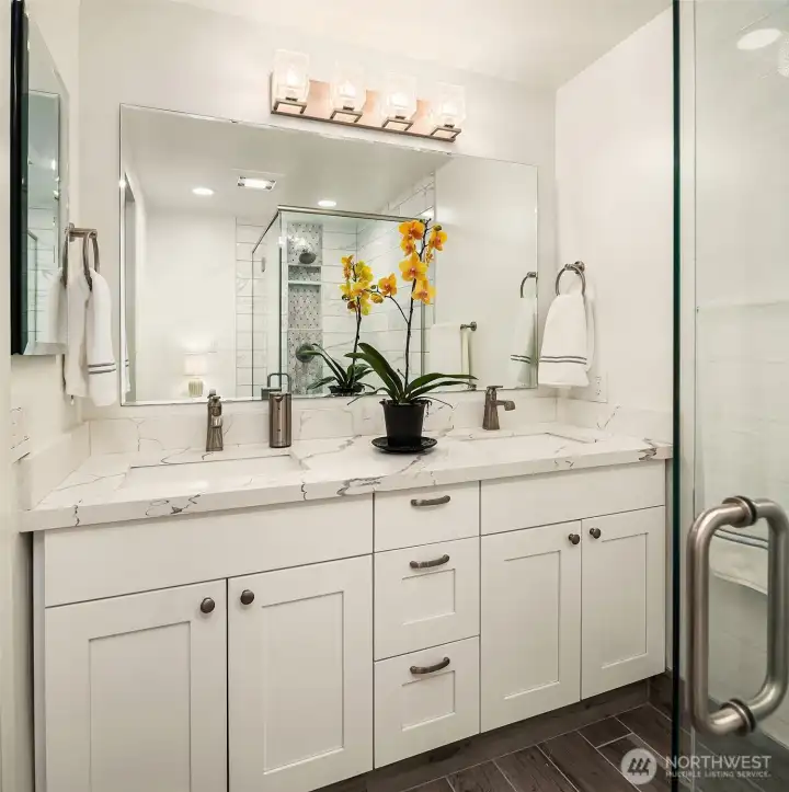 Spa-like finishes in the primary suite bath exudes luxury. Spa-like finishes in the primary suite bath exudes luxury.