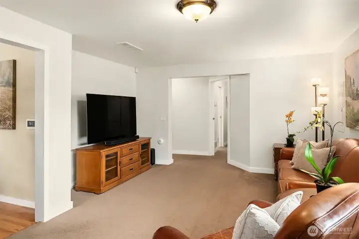 Great room offers gathering spaces for the Holidays, big games, or documentaries all while emphasizing clean lines. Great room offers gathering spaces for the Holidays, big games, or documentaries all while emphasizing clean lines.