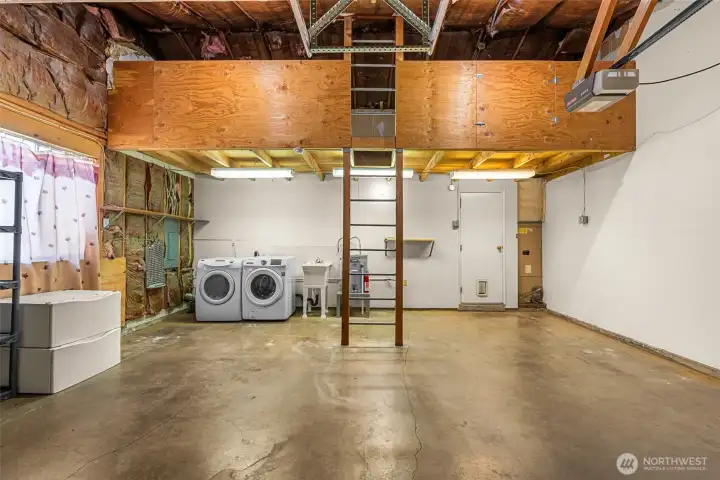 Washer/dryer and laundry sink in garage with dedicated water heater Washer/dryer and laundry sink in garage with dedicated water heater