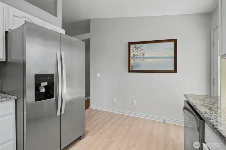 Kitchen view two, hallway to your left and door to your patio on the right. Kitchen view two, hallway to your left and door to your patio on the right.