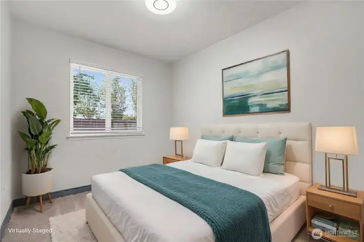 Bedroom #2 view, nice flooring and updated light fixture. ***Virtually Staged*** Bedroom #2 view, nice flooring and updated light fixture. ***Virtually Staged***