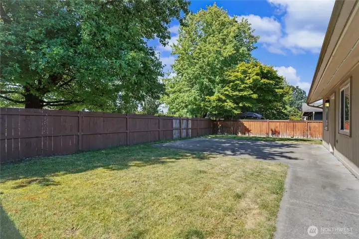 Backyard view, WOW! Look at all the space & expanded patio and concrete! Fully-fenced and ready for play or relaxation. Backyard view, WOW! Look at all the space & expanded patio and concrete! Fully-fenced and ready for play or relaxation.