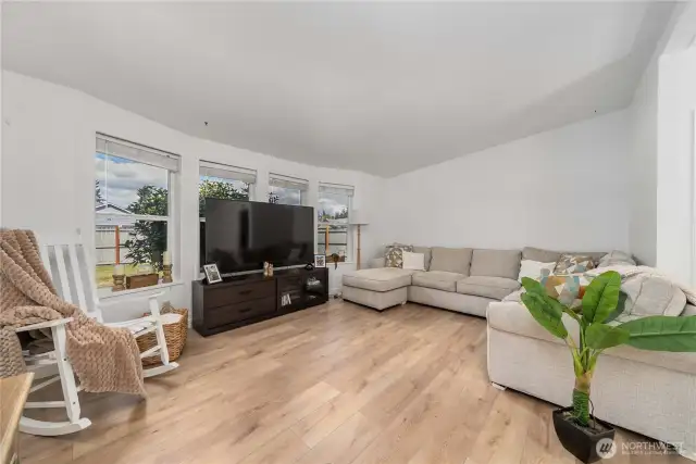 Living room with bay windows