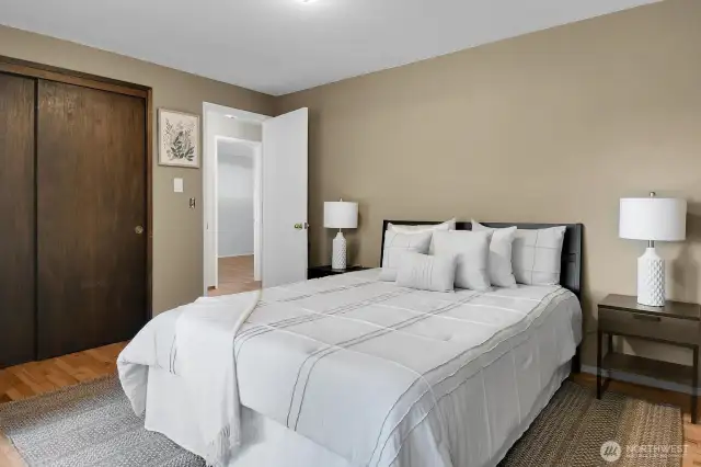 Comfortable primary bedroom.