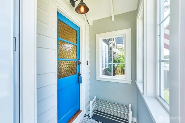 Front porch is a great place to shuck boots and coats after a walk on the beach