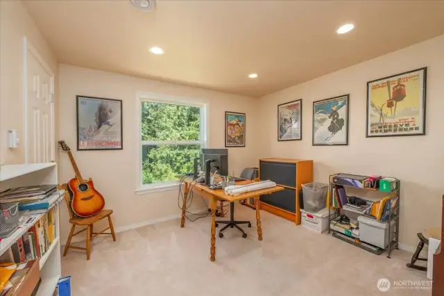 Upper-level guest bedroom.