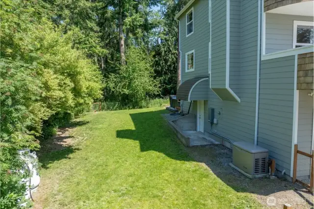 Fenced side yard.