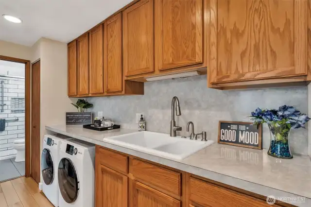 Kitchen has the newer washer & dryer under the counter.