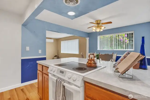 Kitchen is open to dining room and living room.