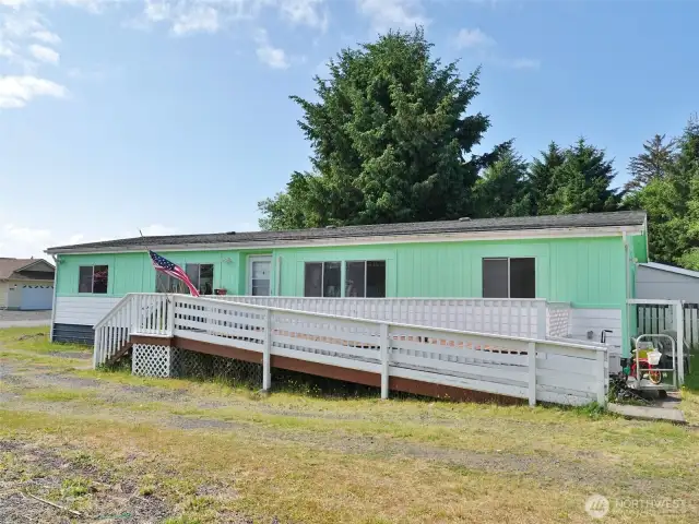 South-side view with ramp to the deck.