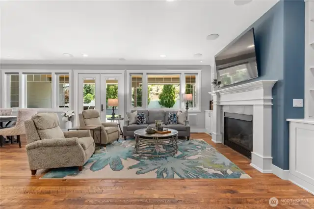 Beautiful open-concept living room where natural light beams in through the windows.