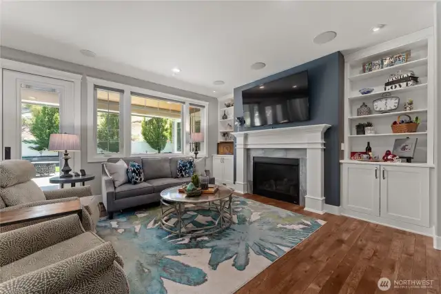 Gas fireplace with custom cabinetry built-in.
