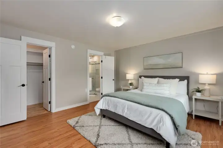 Primary bedroom has walk in closet and walk in shower.