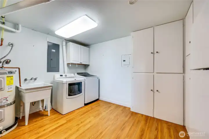 Laundry has sink and tons of storage.