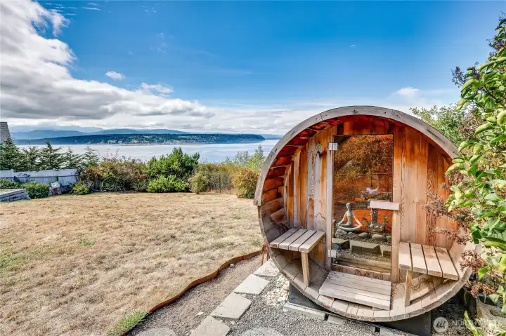 6 person, redwood plank, barrel sauna, just behind photo is a cold plunge shower.