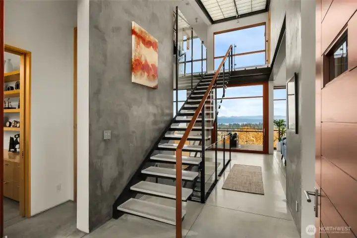 Designed for privacy yet open to the view, this home balances calm & connection.