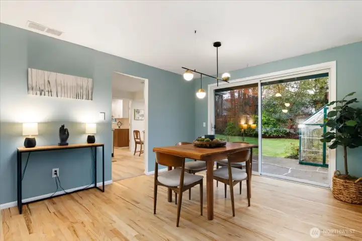 The dining area can easily accommodate a buffet or hutch on the north wall.