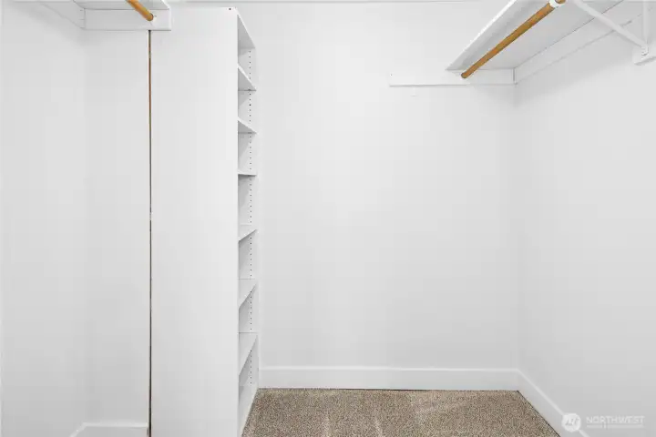 Primary bedroom walk-in closet.