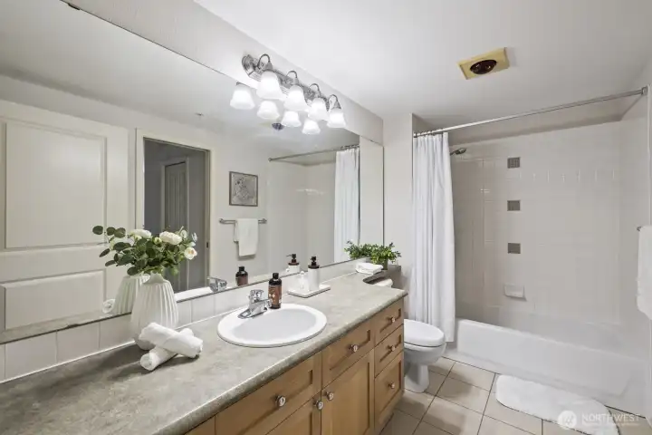 Nicely appointed full bath can be accessed from the living areas or from the bedroom.