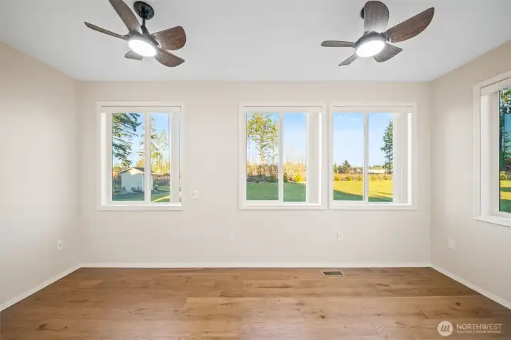 Last room of the main floor addition is a bonus space that would make a great craft room with all of the windows. Or office.