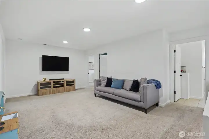 View of your massive loft as you reach the top of the stairs.