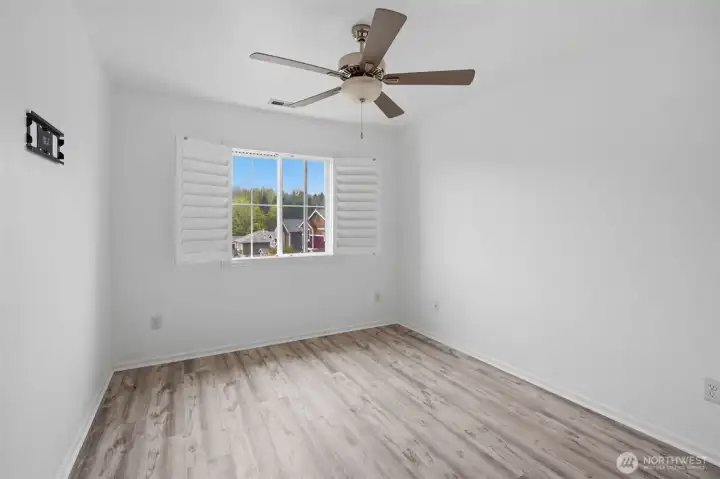 Fourth bedroom with a comfortable layout and natural light. potential to fit your needs.