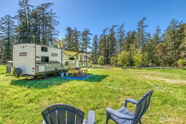 Sunny, level lot offering easy outdoor living today and an ideal setting for your future home.