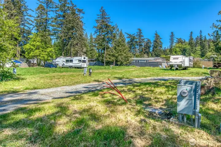 Easy county road access with OPALCO power connected and fiber conduit in place for internet.