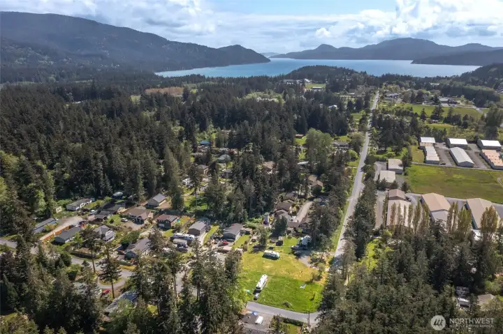 Prime location just minutes from Eastsound Village, offering convenient access to shops, restaurants, and a vibrant island community.