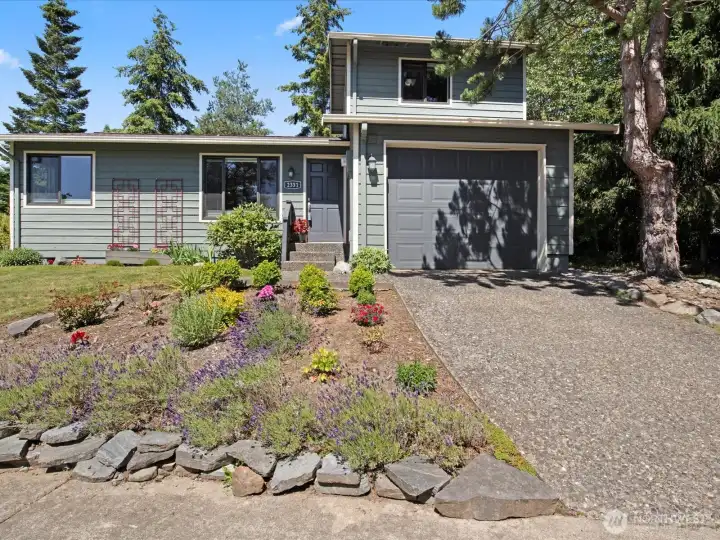 Single car garage with extra parking on the street