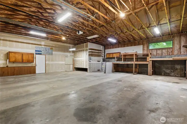 Three bay, large attached shop.