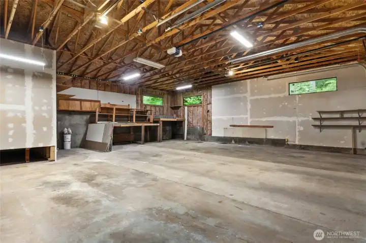 Well maintained shop with ample storage and room for large equipment and toys.