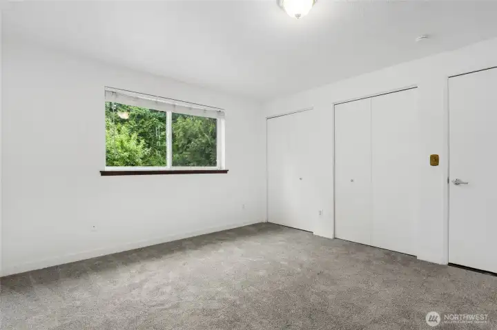 Bedroom #4.  Can be accessed as part of the main home or the separate living space, depending on your needs.  Door locks off from the inside.