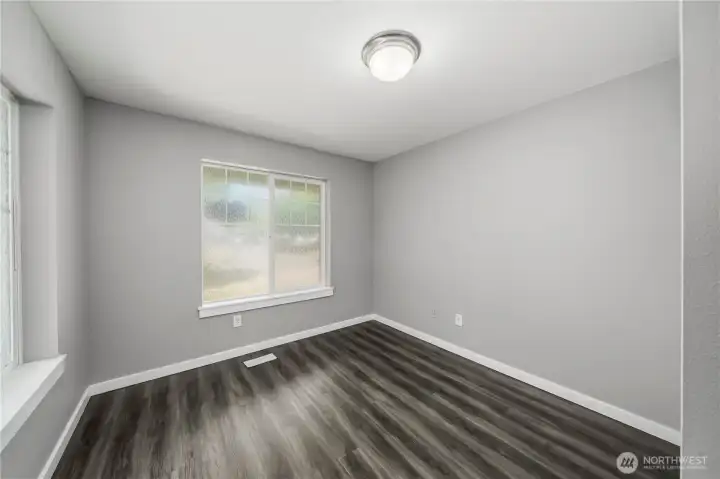 Convenient downstairs bedroom with natural light and versatile use options