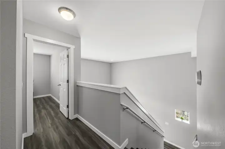 Upstairs landing area with easy access to all bedrooms and the hall bathroom