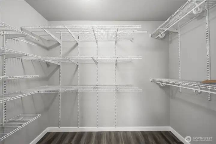 Large walk-in closet in the main bedroom with abundant storage space