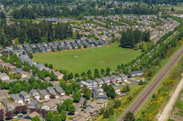 Nearby Horizon Park featuring open green space, playground, and soccer fields
